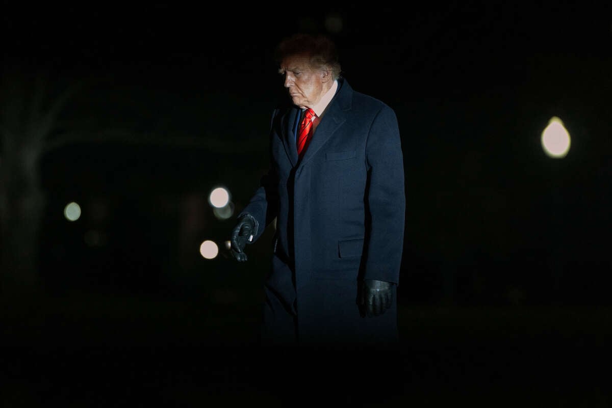 President Donald Trump walks across the South Lawn of the White House after returning from a weekend trip on January 27, 2025, in Washington, D.C.