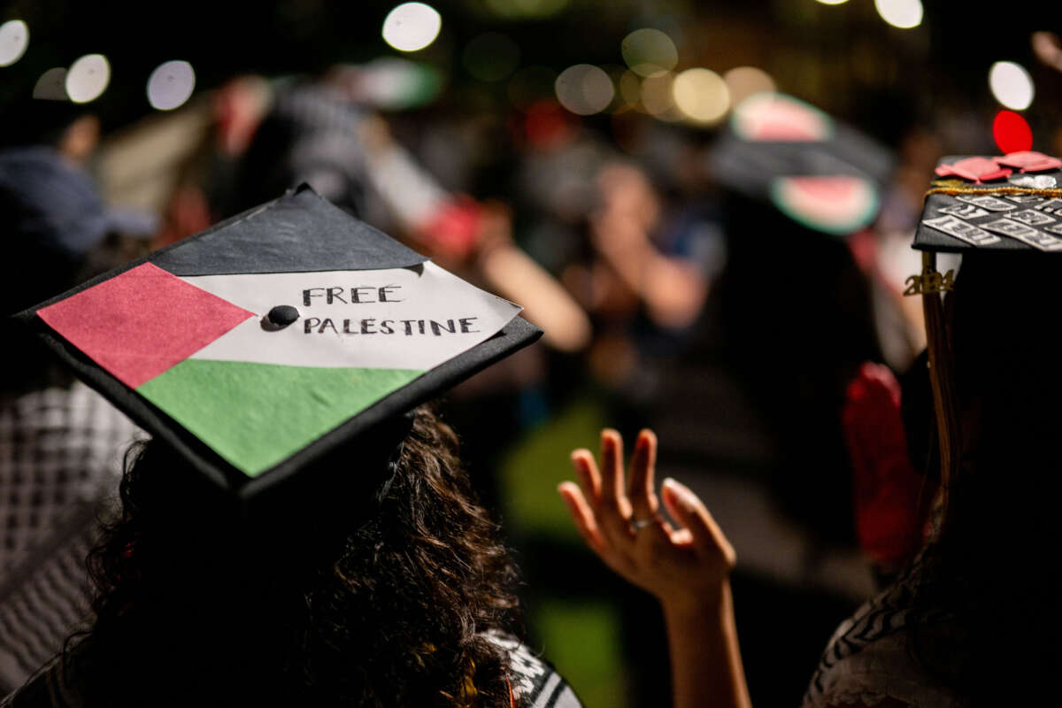 Graduate students and demonstrators protest the war on Gaza after walking out of commencement at the Darrell K Royal-Texas Memorial Stadium on May 11, 2024, in Austin, Texas.