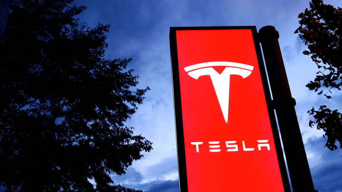 The Tesla Inc. logo is pictured on a sign in Zrich, Switzerland, on November 13, 2023.