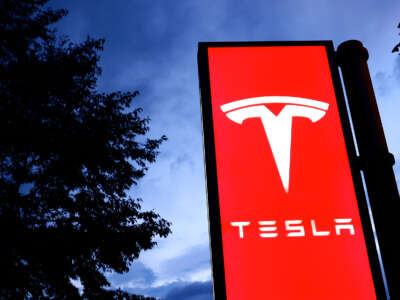 The Tesla Inc. logo is pictured on a sign in Zrich, Switzerland, on November 13, 2023.