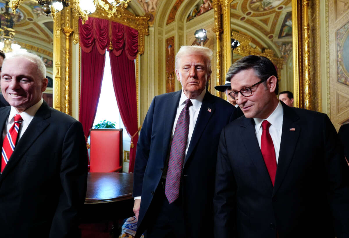 President Donald Trump speaks with House Majority Leader Steve Scalise and House Speaker Mike Johnson following a signing ceremony in the President's Room following the 60th inaugural ceremony on January 20, 2025, at the U.S. Capitol in Washington, D.C.