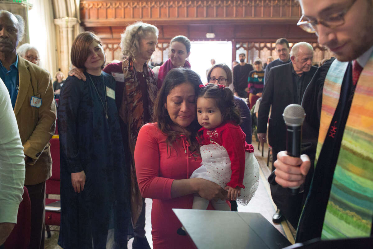 Aura Hernandez, an undocumented immigrant from Guatemala, and her daughter, are introduced to the congregation of the Fourth Universalist Society, and formally offered sanctuary by the church on March 18, 2018, in New York City.