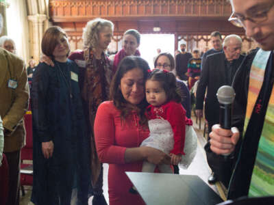 Aura Hernandez, an undocumented immigrant from Guatemala, and her daughter, are introduced to the congregation of the Fourth Universalist Society, and formally offered sanctuary by the church on March 18, 2018, in New York City.