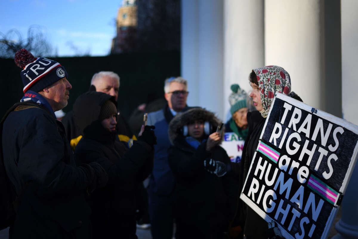 A group of trans rights activists face Trump supporters near the White House in Washington, D.C., on January 20, 2025.