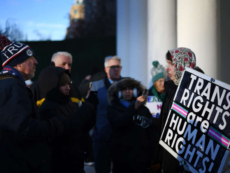 A group of trans rights activists face Trump supporters near the White House in Washington, D.C., on January 20, 2025.