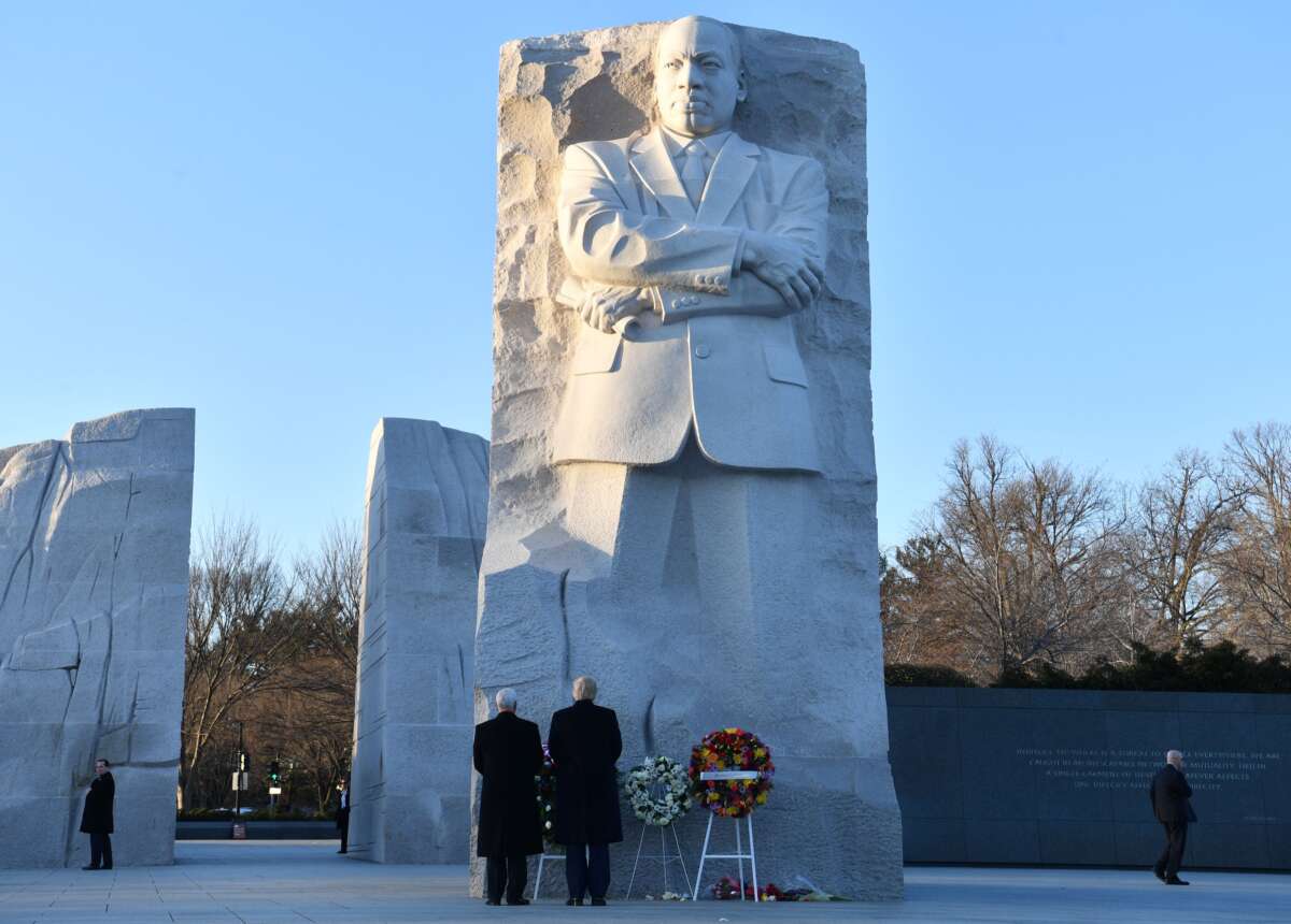 President Donald Trump and Vice President Mike Pence look on at the Martin Luther King Jr. memorial on MLK day in Washington, D.C., on January 20, 2020.