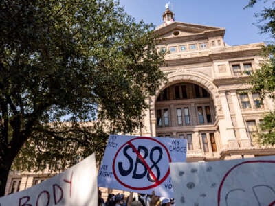 Abortion rights activists rally at the Texas State Capitol to protest SB8, an abortion bounty bill, on September 11, 2021, in Austin, Texas.