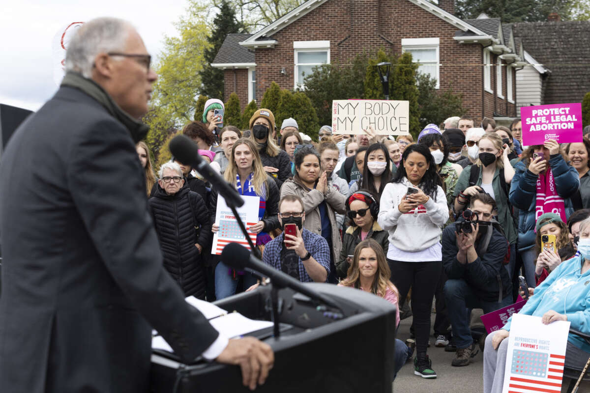 Washington state Governor Jay Inslee speaks to media and people gathered at Kerry Park about patient's rights to abortion and reproductive healthcare during a pro-choice rally in Seattle, Washington on May 3, 2022.