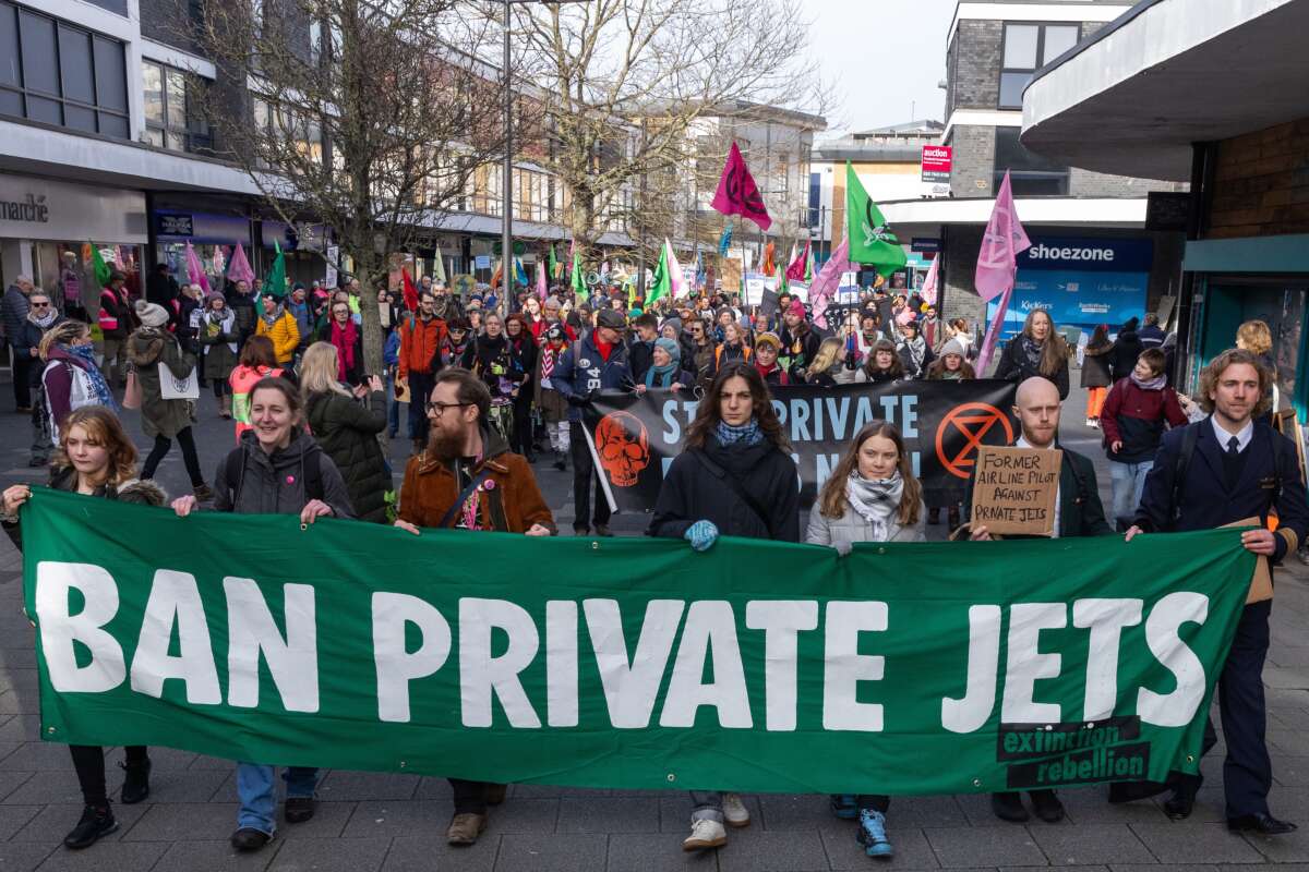 Climate activists including Greta Thunberg protest private jet flights and the proposed expansion of Farnborough Airport on January 27, 2024, in Farnborough, United Kingdom.