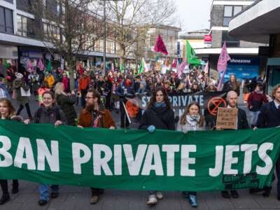 Climate activists including Greta Thunberg protest private jet flights and the proposed expansion of Farnborough Airport on January 27, 2024, in Farnborough, United Kingdom.