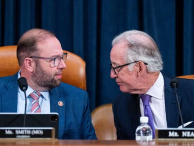 Chairman Jason Smith, left, speaks with ranking member Rep. Richard Neal before the start of the House Ways and Means Committee markup hearing in the Longworth House Office Building on September 11, 2024.