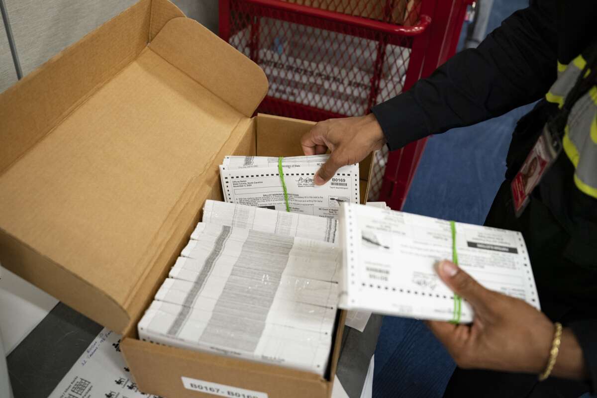 Absentee ballots are prepared to be mailed at the Wake County Board of Elections on September 17, 2024, in Raleigh, North Carolina.