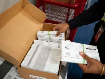 Absentee ballots are prepared to be mailed at the Wake County Board of Elections on September 17, 2024, in Raleigh, North Carolina.