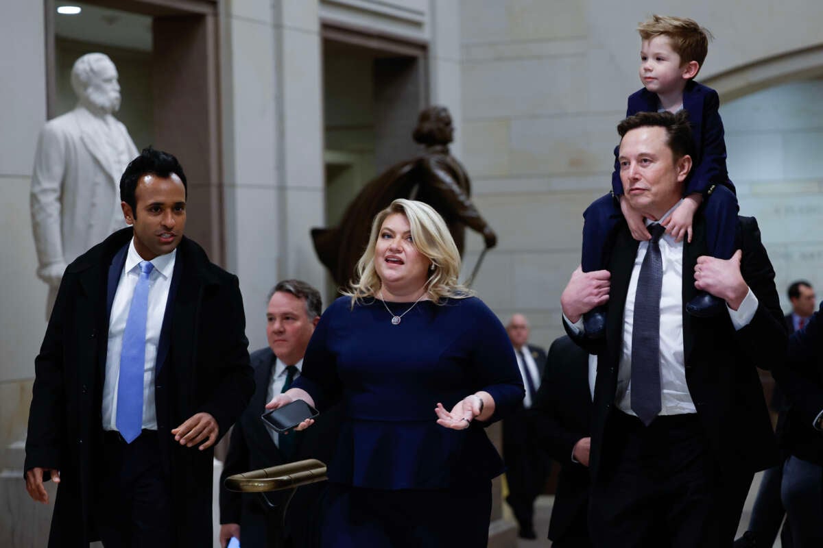 Vivek Ramaswamy (left), Rep. Kat Cammack and Tesla CEO Elon Musk, as seen on December 5, 2024, in Washington, D.C.