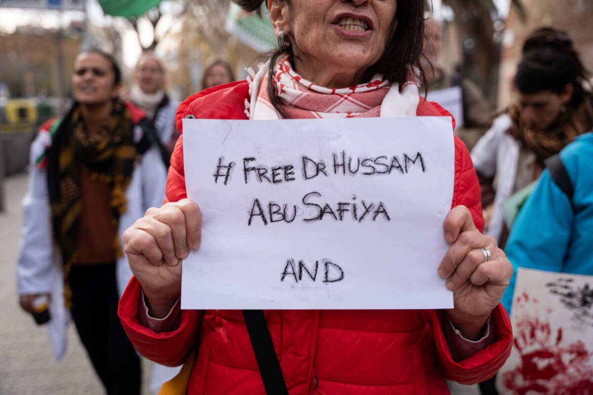 Dozens of health workers and other people demand the release of Dr. Hussam Abu Safiya, director of the Kamal Adwan hospital, one of the last that remained operational in the Gaza Strip, in Barcelona, Spain, on January 3, 2025.