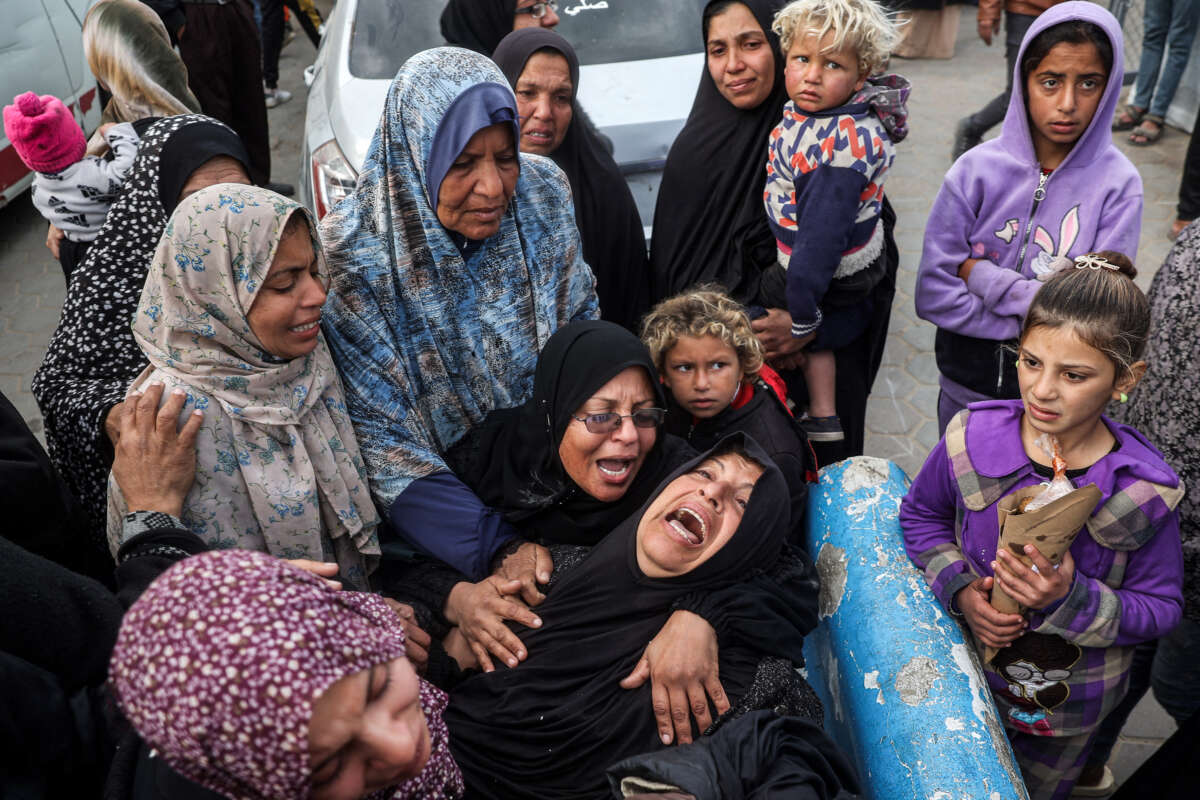 Women mourn their relatives who were killed by Israeli bombardment outside the Aqsa Martyrs hospital in Deir el-Balah in the central Gaza Strip, on January 5, 2025.