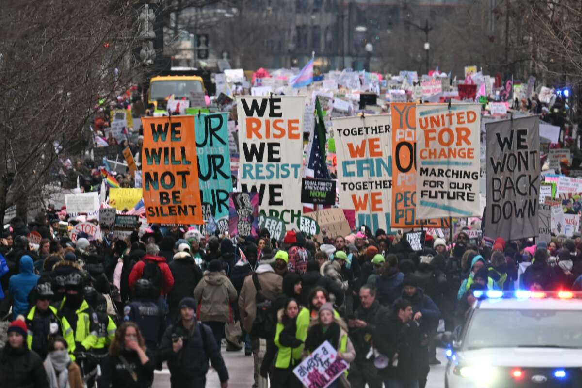 Protesters rally during the "People's March on Washington" in Washington, D.C., on January 18, 2025, ahead of the inauguration of President-elect Donald Trump.