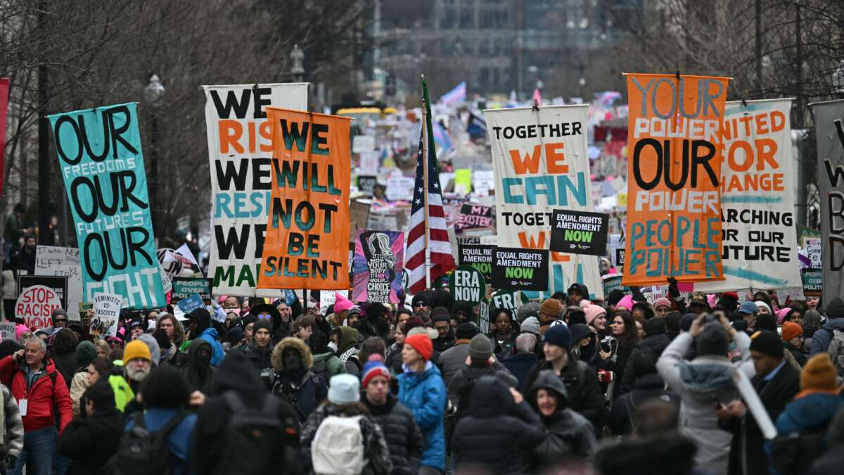 Protesters rally during the People's March on Washington in Washington, D.C. on January 18, 2025, ahead of the inauguration of U.S. President-elect Donald Trump.