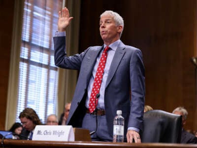 Chris Wright, President-elect Donald Trump's nominee for Energy Secretary, is sworn in during his Senate Energy and Natural Resources confirmation hearing on Capitol Hill on January 15, 2025, in Washington, D.C.