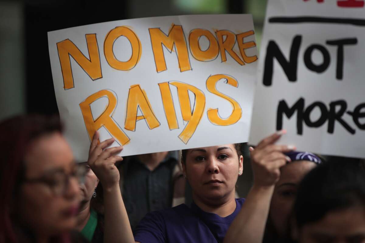 Activists rally against racial profiling by Immigration and Customs Enforcement outside of the Dirksen Federal Building following a court hearing on June 11, 2018, in Chicago, Illinois.