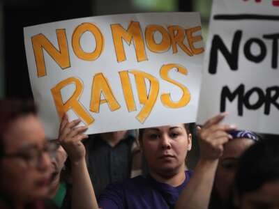 Activists rally against racial profiling by Immigration and Customs Enforcement outside of the Dirksen Federal Building following a court hearing on June 11, 2018, in Chicago, Illinois.