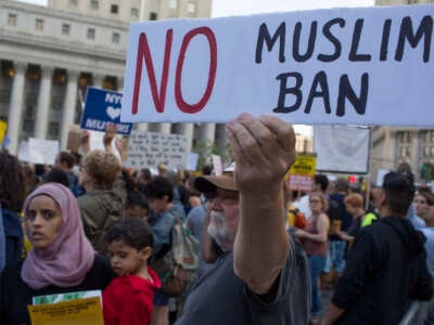 Protestors gather to demonstrate against the Supreme Court's 5-4 decision to uphold President Donald Trump's travel ban against five Muslim-majority nations on June 26, 2018, in Foley Square, New York City.