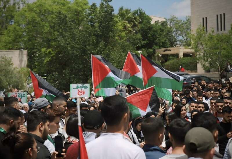 Students protest the ongoing genocide in Gaza during a demonstration at Birzeit University.