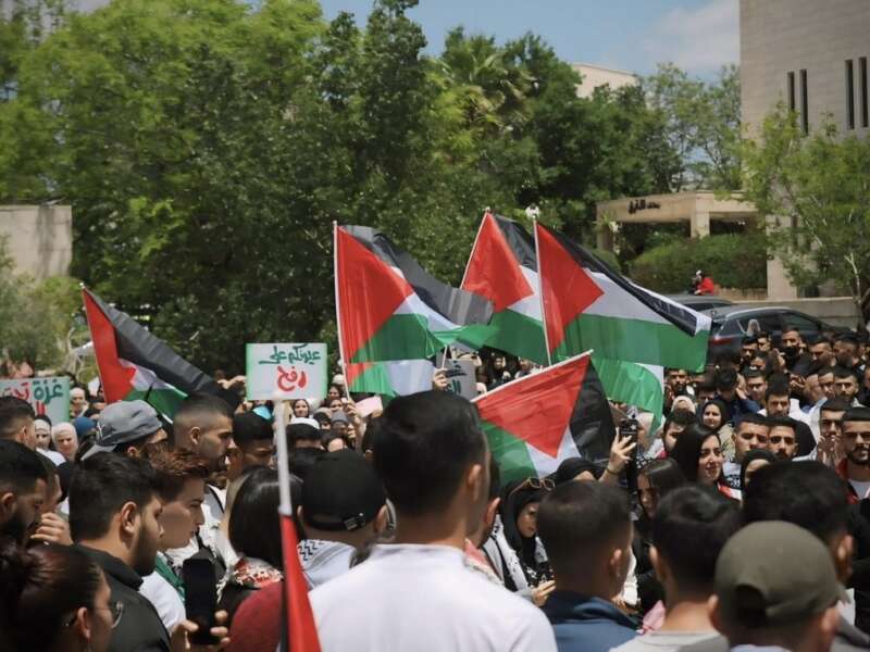 Students protest the ongoing genocide in Gaza during a demonstration at Birzeit University.