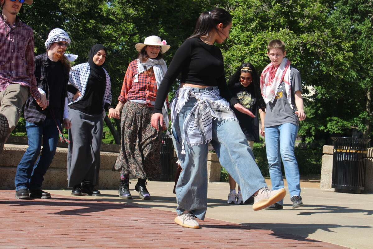 Mizzou students perform dabkeh (a popular folk dance in Palestine and beyond) at a speakers circle at the University of Missouri, Columbia, during a week-long event that established a Liberated Zone on campus from May 6-12, 2024.