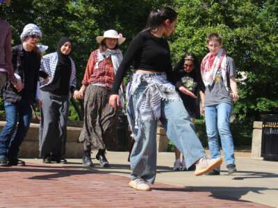 Mizzou students perform dabkeh (a popular folk dance in Palestine and beyond) at a speakers circle at the University of Missouri, Columbia, during a week-long event that established a Liberated Zone on campus from May 6-12, 2024.