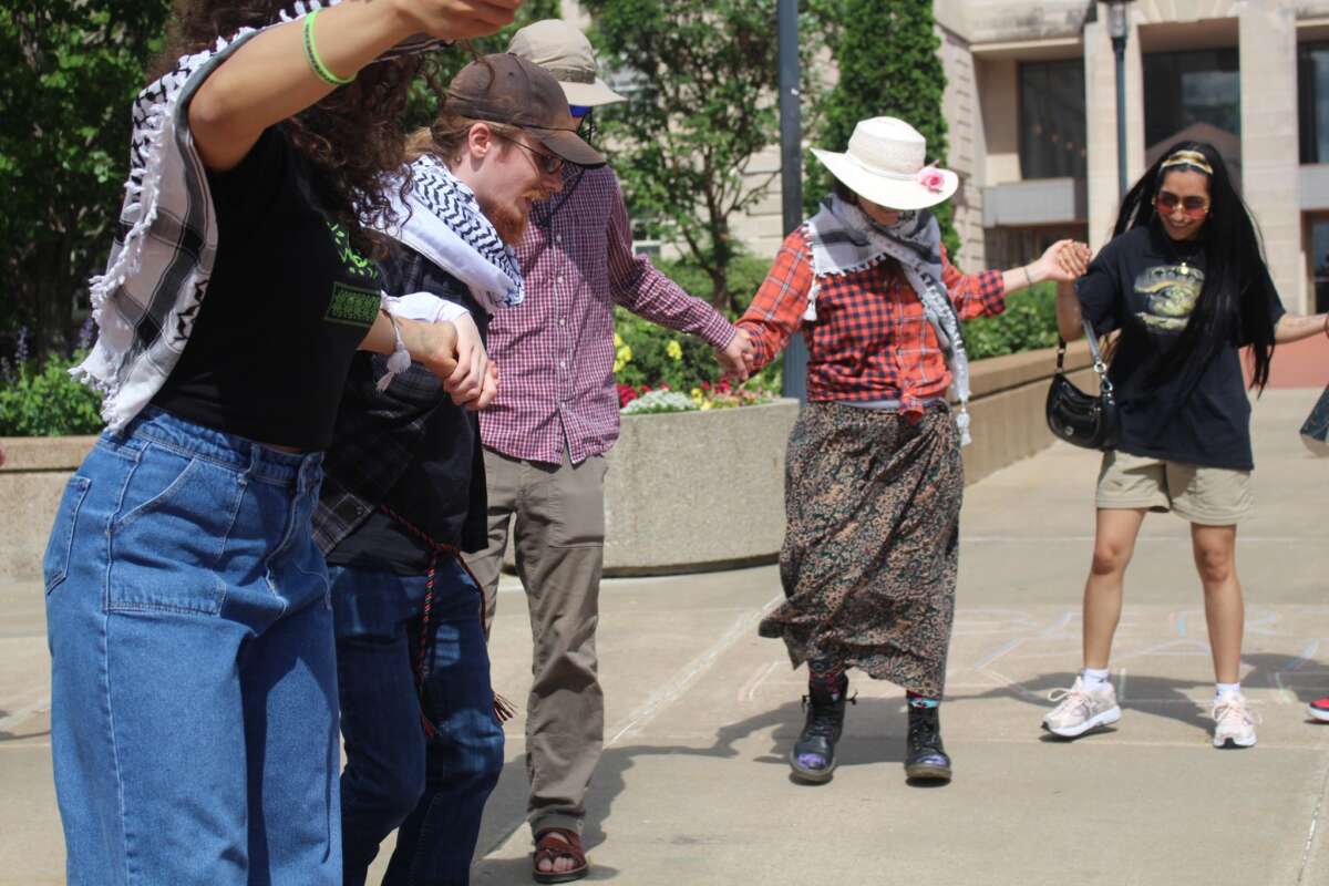 Mizzou students perform dabkeh (a popular folk dance in Palestine and beyond) at a speakers circle at the University of Missouri, Columbia, during a week-long event that established a Liberated Zone on campus from May 6-12, 2024.