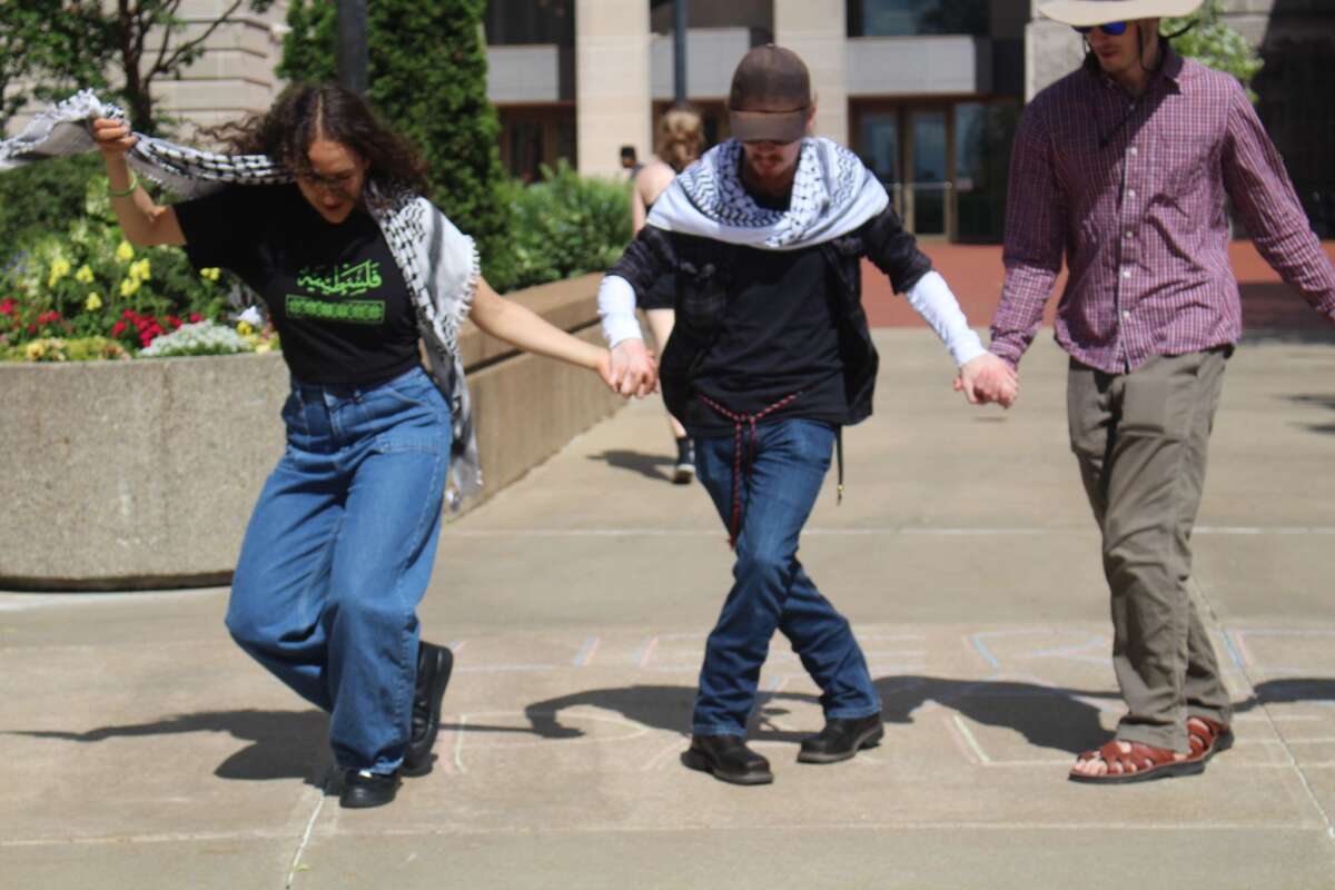 Mizzou students perform dabkeh (a popular folk dance in Palestine and beyond) at a speakers circle at the University of Missouri, Columbia, during a week-long event that established a Liberated Zone on campus from May 6-12, 2024.