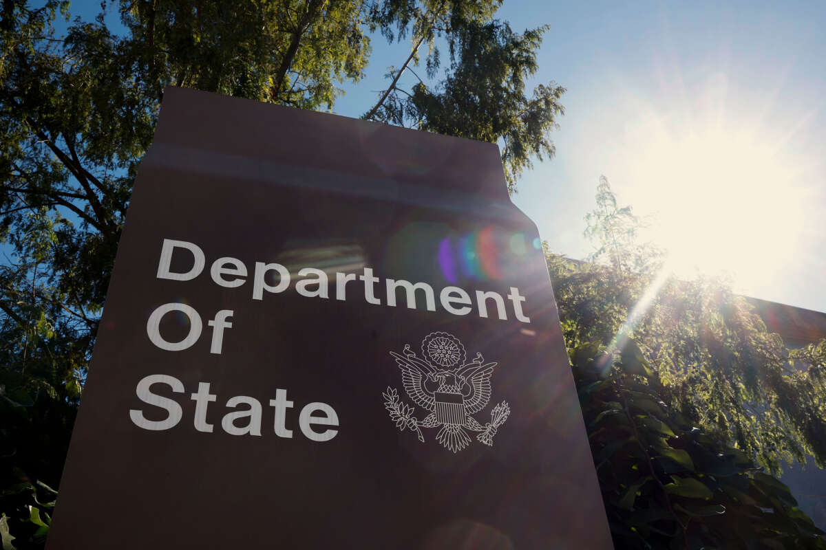 A sign for the U.S. Department of State is seen on the outside of the Harry S. Truman Federal Building on October 8, 2024, in Washington, D.C.