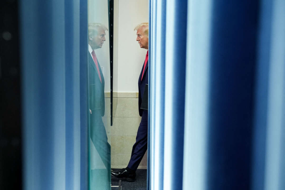 President Donald Trump arrives to speak about the mid-air crash between American Airlines Flight 5342 and a military helicopter, in the Brady Press Briefing Room at the White House on January 30, 2025, in Washington, D.C.