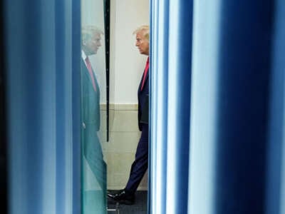 President Donald Trump arrives to speak about the mid-air crash between American Airlines Flight 5342 and a military helicopter, in the Brady Press Briefing Room at the White House on January 30, 2025, in Washington, D.C.