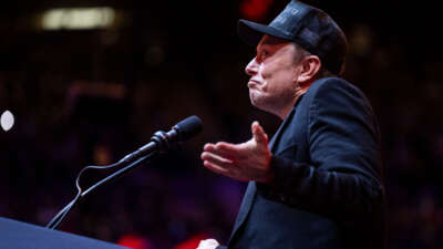 Elon Musk speaks before Republican presidential nominee former President Donald Trump at a campaign rally at Madison Square Garden in New York, on October 27, 2024.