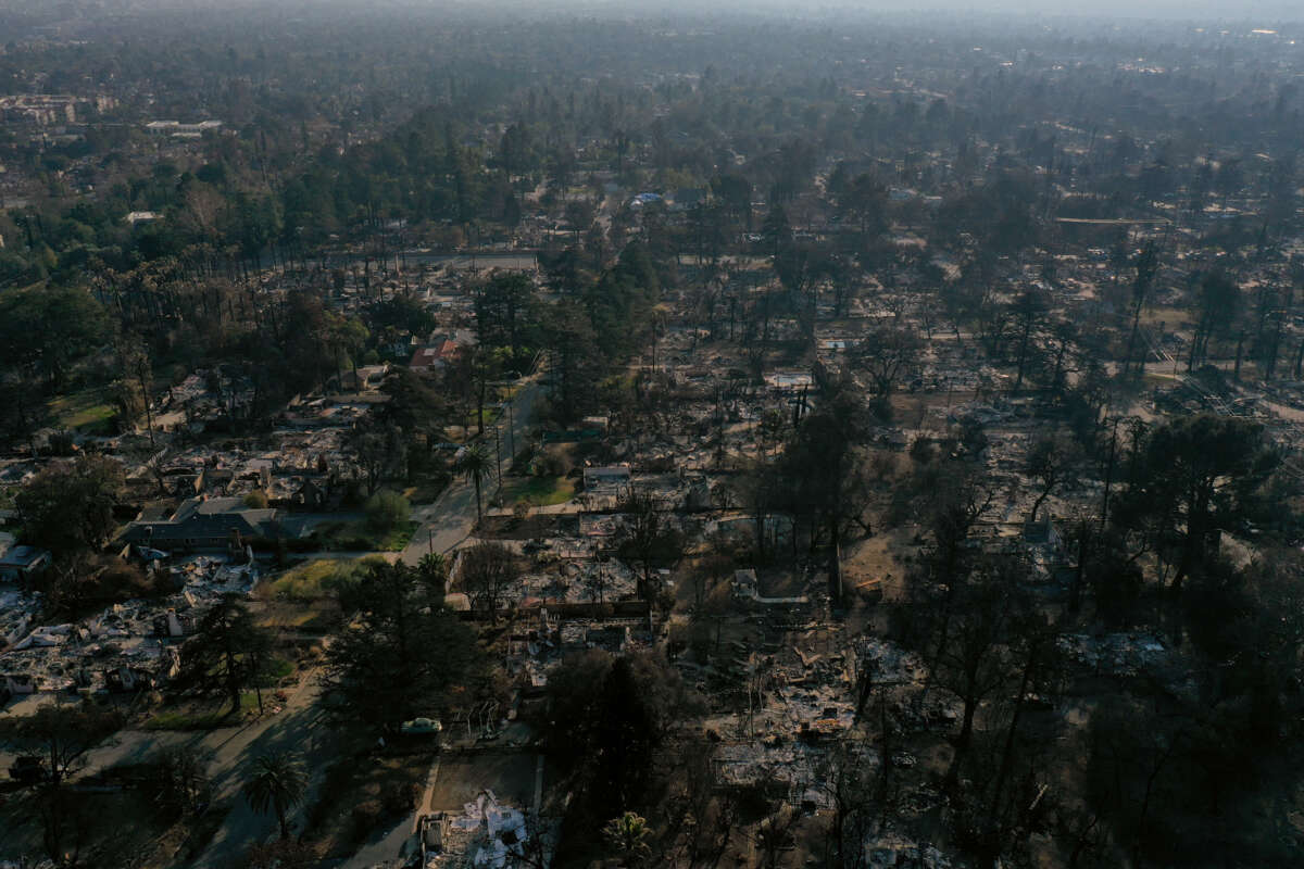 An aerial view of a neighborhood destroyed by fire