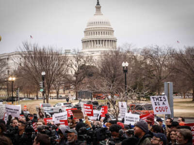 Protesters rally against the Department of Government Efficiency (DOGE) outside the U.S. Department of Labor on February 5, 2025, in Washington, D.C.