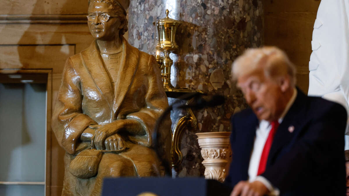 A statue of civil rights organizer Rosa Parks is seen behind President Donald Trump as he speaks during the National Prayer Breakfast at the U.S. Capitol in Washington, D.C., on February 6, 2025.