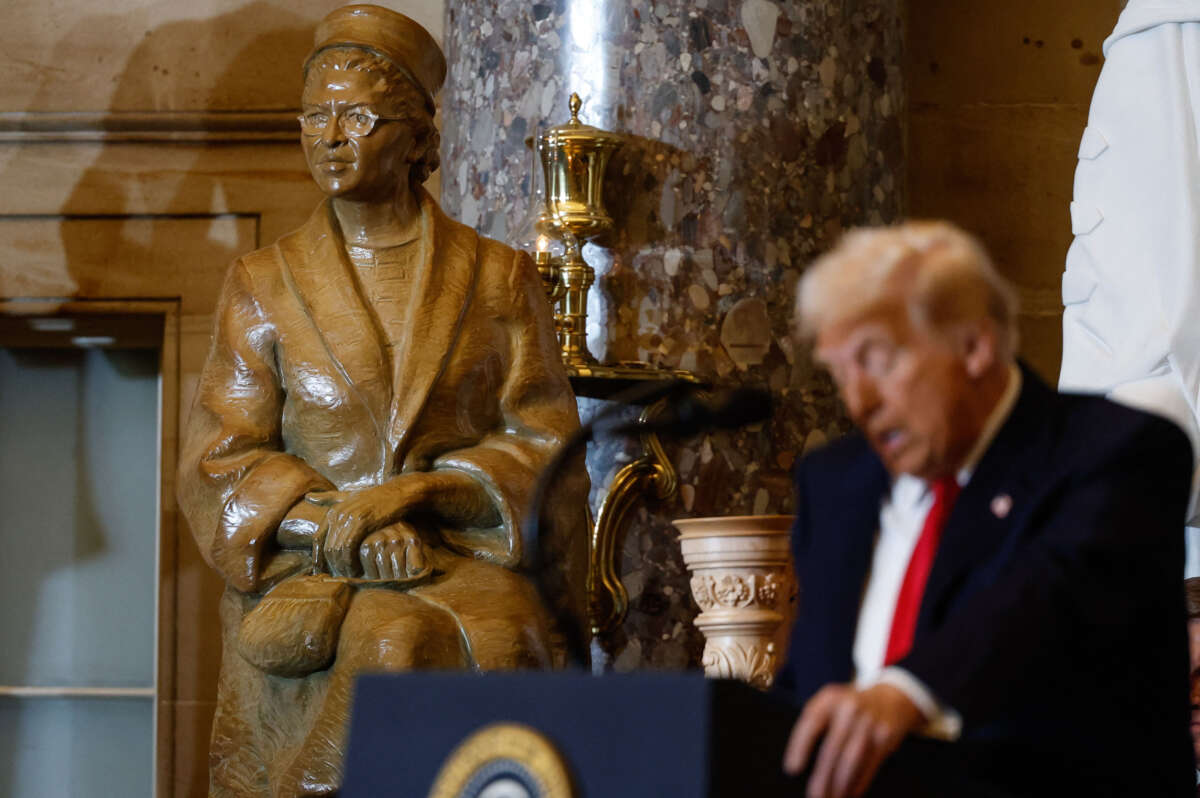 A statue of civil rights organizer Rosa Parks is seen behind President Donald Trump as he speaks during the National Prayer Breakfast at the U.S. Capitol in Washington, D.C., on February 6, 2025.