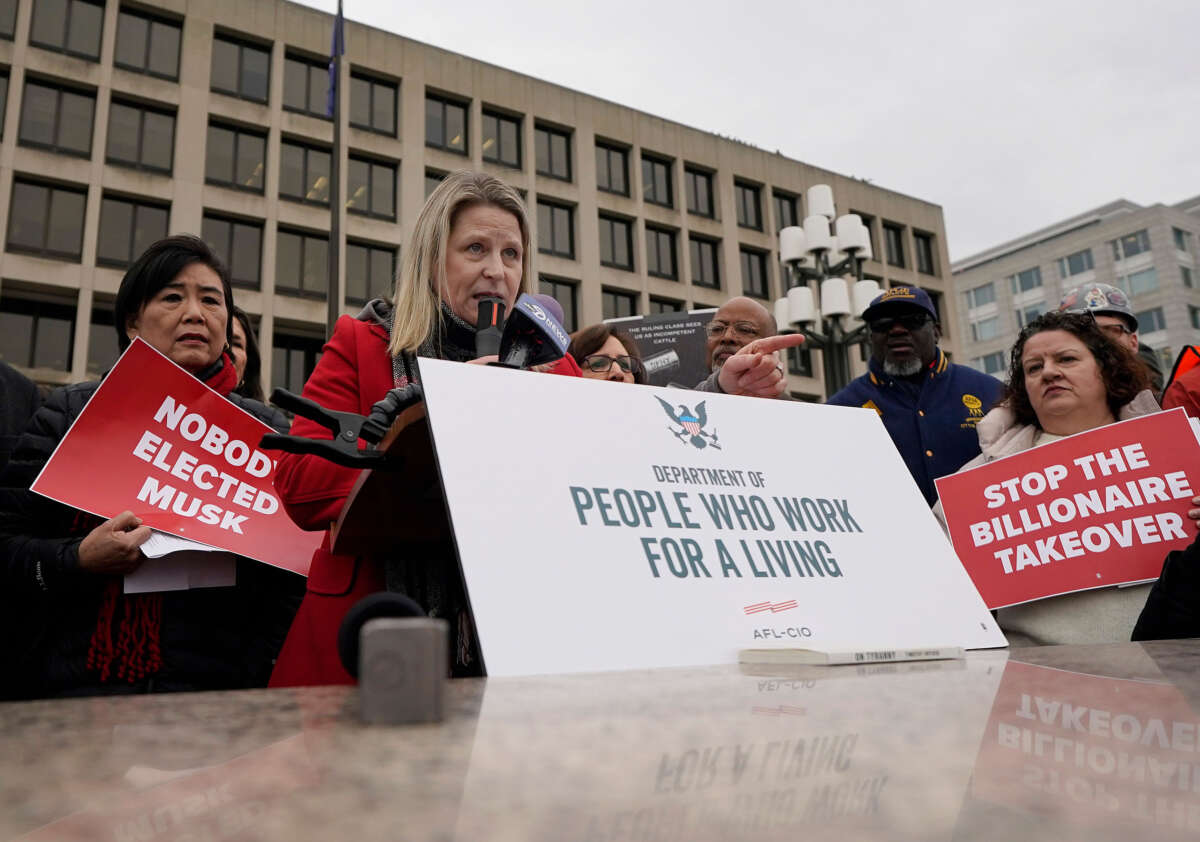 President of the AFL-CIO Liz Shuler speaks at a rally against the Department of Government Efficiency (DOGE) in front of the U.S. Department of Labor on February 5, 2025, in Washington, D.C.