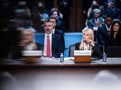 Pam Bondi, President-elect Donald Trump's choice to lead the Justice Department as attorney general, listens during her Senate Judiciary Committee confirmation hearing on Capitol Hill on January 15, 2025, in Washington, D.C.