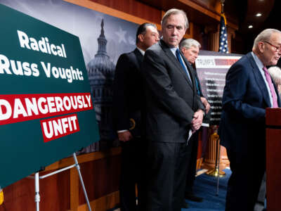 Senate Minority Leader Chuck Schumer, right, holds a media availability with Senate Budget Committee Democrats in protest of the committee advancing Russell Vought's nomination to be director of the Office of Management and Budget on January 30, 2025. From left with Schumer are Senators Alex Padilla, Jeff Merkley, Sheldon Whitehouse and Patty Murray.