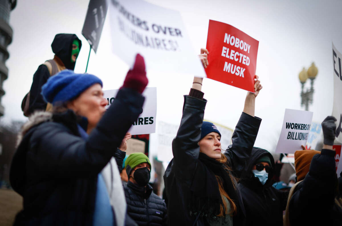 Protesters rally against the Department of Government Efficiency (DOGE) outside the U.S. Department of Labor on February 5, 2025, in Washington, D.C.