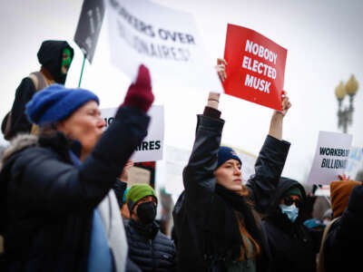 Protesters rally against the Department of Government Efficiency (DOGE) outside the U.S. Department of Labor on February 5, 2025, in Washington, D.C.