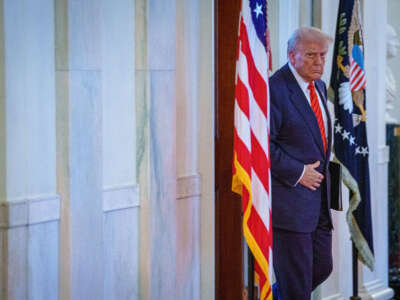 President Donald Trump arrives to sign an executive order in the East Room of the White House on February 5, 2025, in Washington, D.C.