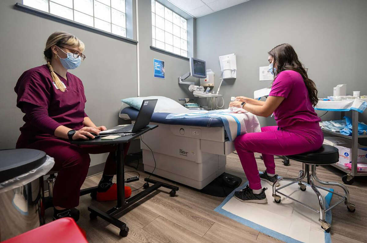 A registered nurse and an associate medical director prepare to provide a procedural abortion for a patient on February 15, 2025, at Planned Parenthood Great Plains in Kansas City, Missouri. It was the first procedural abortion in Kansas City in about 15 years.