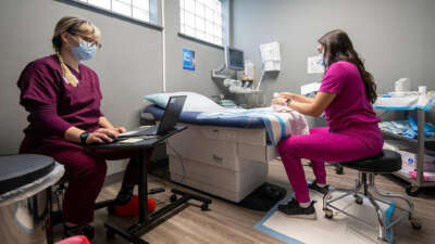 A registered nurse and an associate medical director prepare to provide a procedural abortion for a patient on February 15, 2025, at Planned Parenthood Great Plains in Kansas City, Missouri. It was the first procedural abortion in Kansas City in about 15 years.