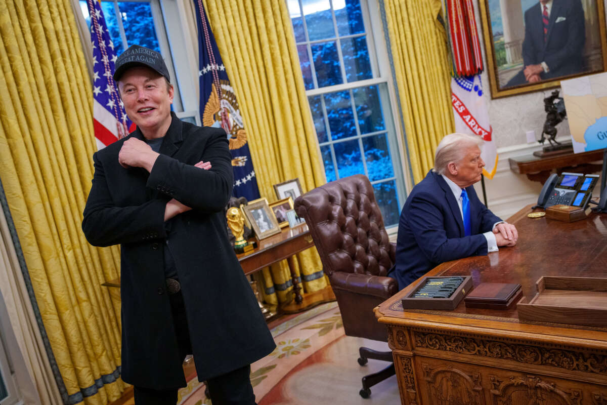 Tesla and SpaceX CEO Elon Musk and President Donald Trump appear during an executive order signing in the Oval Office at the White House on February 11, 2025, in Washington, D.C.