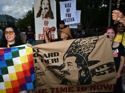 Indigenous rights activists take part in a rally in support of imprisoned Native American activist Leonard Peltier, at Lafayette Square across from the White House, in Washington, D.C., on September 12, 2023.